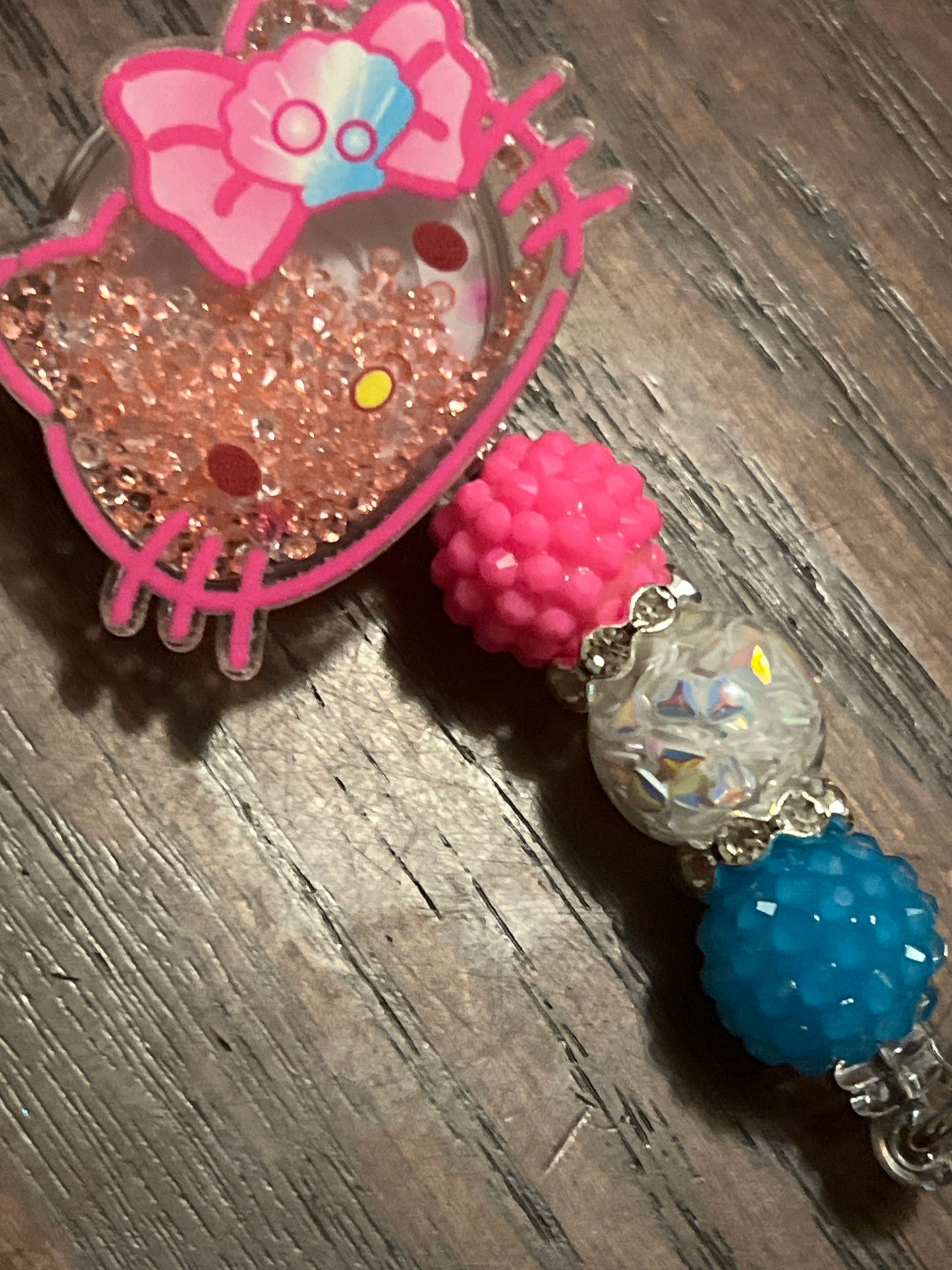 HELLO KITTY BADGE REEL