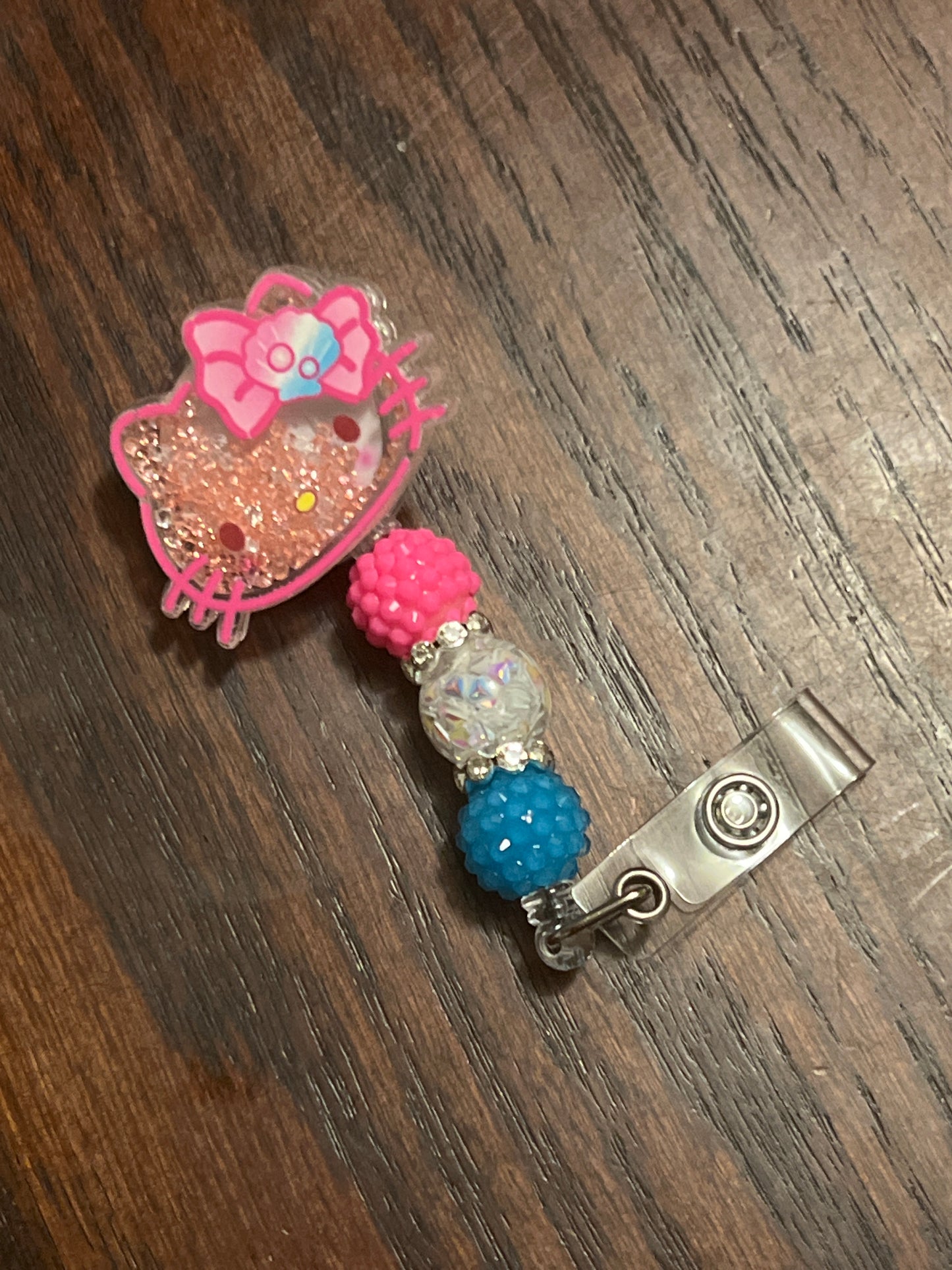 HELLO KITTY BADGE REEL